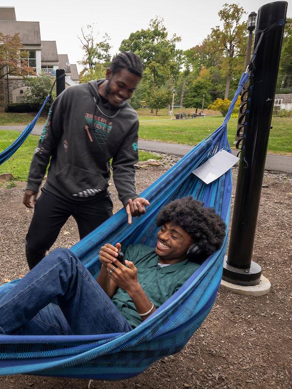 Two students laughing at Hammock Grove